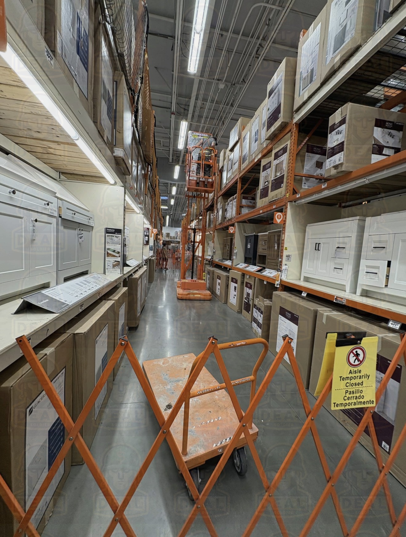 Home Depot vanity aisle with boxed vanity cabinets stacked on shelves.