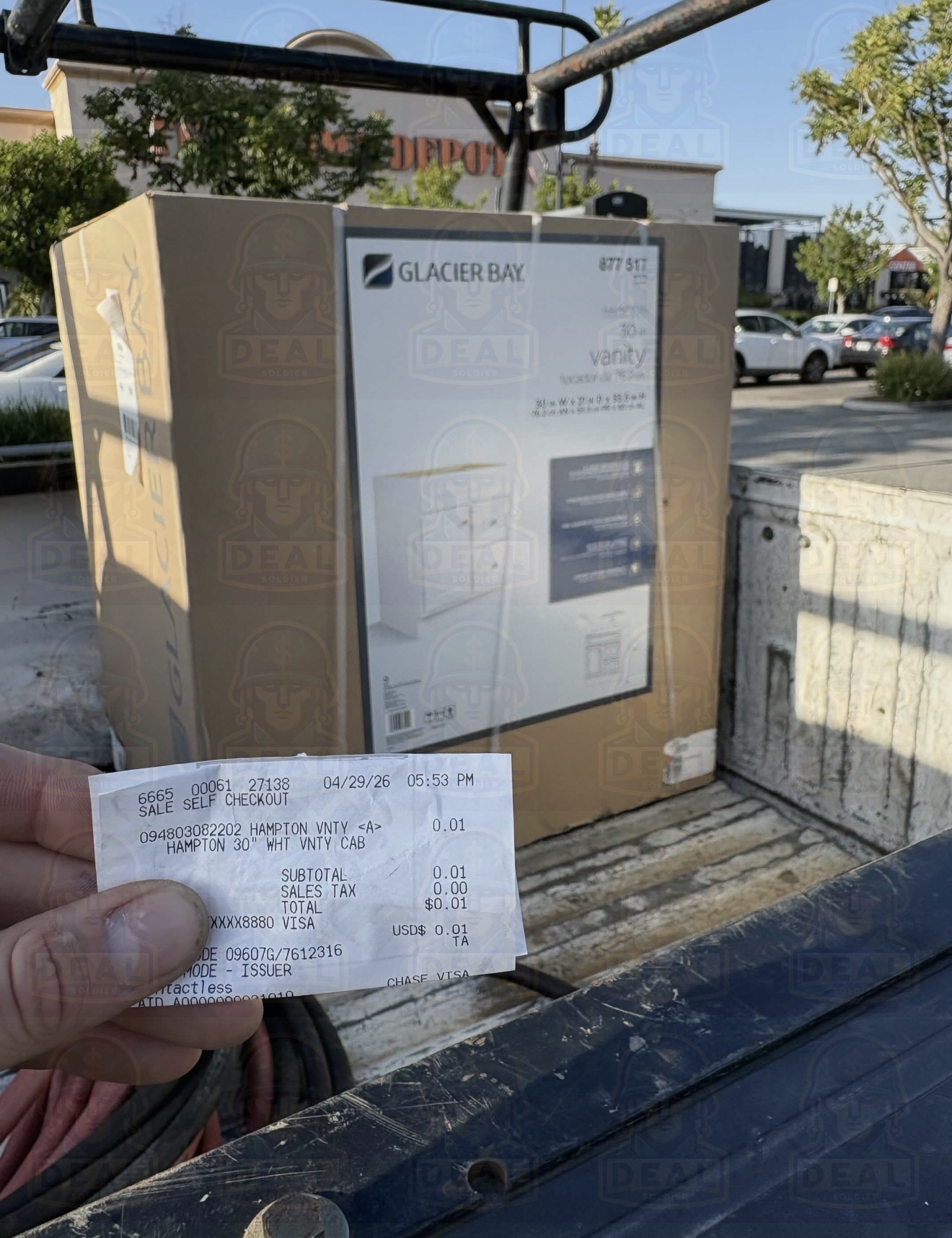 Glacier Bay Hampton 30 inch vanity box in a pickup truck bed outside Home Depot, hand holding a $0.01 receipt.